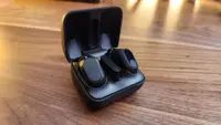 The Sony Inzone Buds case, ear bud, and USB charger.