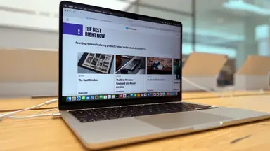 The Apple MacBook Air M4 13-inch laptop on a wooden desk