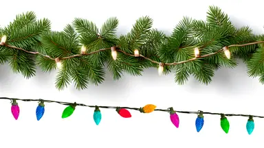 White string lights on evergreen garland above a string of colored lights