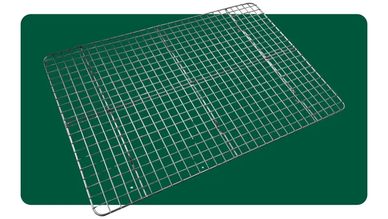 Wire rack on a green background