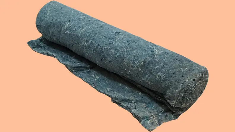 A roll of recycled denim insulation.