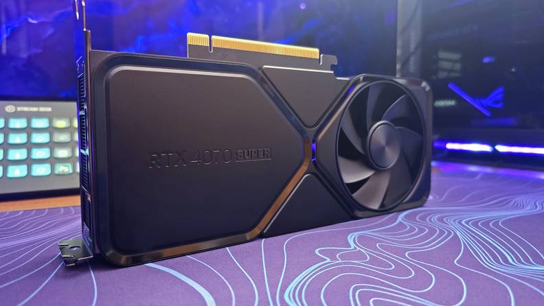 The Nvidia RTX 4070 on a purple and blue mat.