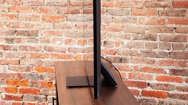 A profile shot of a TCL QM8 LED TV showing off its design.