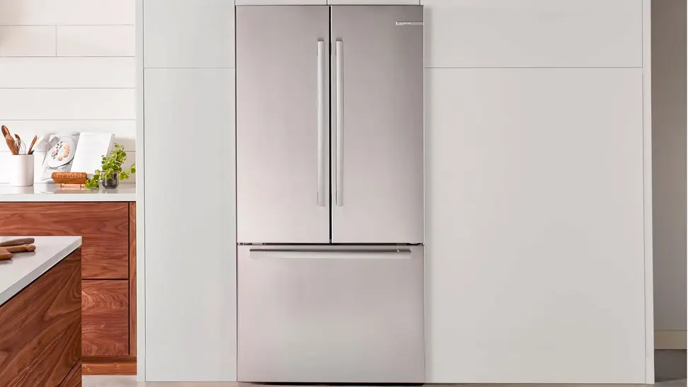 A vanity shot of the Bosch B36CT80SNS French-door refrigerator installed in an upscale kitchen.