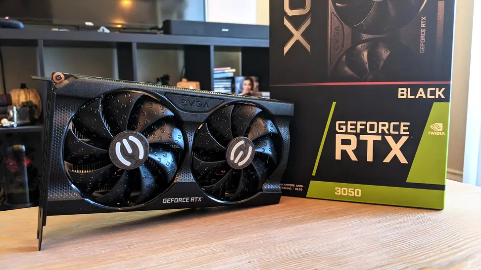 A desktop GPU next to its packaging box