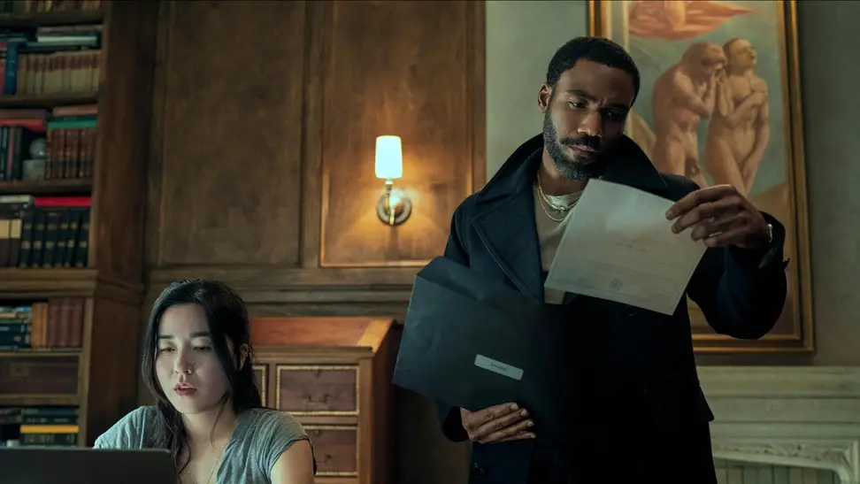 Maya Erskine, left, and Donald Glover in a scene from "Mr. and Mrs. Smith."